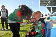 11 May 2012; Jamie Forry, aged 6, from Tuam, Co. Galway, gets his face painted by Grace Dodd during a Mayo GAA Open Day 2012. Elverys MacHale Park, Castlebar, Co Mayo. Picture credit: Barry Cregg / SPORTSFILE