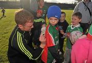 11 May 2012; Cathal Clarke, aged 8, from Foxford, Co. Mayo, gets his jersey signed by goalkeeper Robert Henley during a Mayo GAA Open Day 2012. Elverys MacHale Park, Castlebar, Co Mayo. Picture credit: Barry Cregg / SPORTSFILE