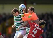 12 May 2012; Gary Rogers, Sligo Rovers, with support from team-mate Gavin Peers, holds on to the ball as he is challenged by Craig Sives, Shamrock Rovers. Airtricity League Premier Division, Sligo Rovers v Shamrock Rovers, The Showgrounds, Sligo. Picture credit: Barry Cregg / SPORTSFILE