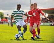 12 May 2012; Kerra Gilbert, Shamrock Rovers, in action against David Cawley, centre, and Iarfhlaith Davoren, Sligo Rovers. Airtricity League Premier Division, Sligo Rovers v Shamrock Rovers, The Showgrounds, Sligo. Picture credit: Barry Cregg / SPORTSFILE
