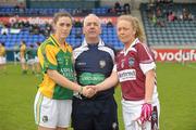 12 May 2012; Leitrim captain Mairead Stenson shakes hands with Westmeath captain Jenny Rogers alonside referee Michael Henry before the start of the game. Bord Gáis Energy Ladies National Football League, Division 3 Final, Westmeath v Leitrim, Parnell Park, Dublin. Photo by Sportsfile