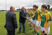 12 May 2012; Pat Quill, left, President of the Ladies Gaelic Football Association, and Nicky Doran, Bord Gais Energy, greet the Leitrim team before the game. Bord Gáis Energy Ladies National Football League, Division 3 Final, Westmeath v Leitrim, Parnell Park, Dublin. Photo by Sportsfile
