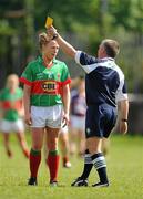12 May 2012; Claire Egan, Mayo, is shown a yellow card by referee Shaun Duane. Bord Gáis Energy Ladies National Football League, Division 2 Final, Galway v Mayo, Parnell Park, Dublin. Picture credit: Brendan Moran / SPORTSFILE