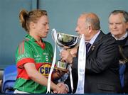 12 May 2012; Mayo captain Claire Egan is presented with the cup by Pat Quill, President of the Ladies Gaelic Football Association. Bord Gáis Energy Ladies National Football League, Division 2 Final, Galway v Mayo, Parnell Park, Dublin. Picture credit: Brendan Moran / SPORTSFILE