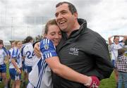 12 May 2012; Meath football manager Seamus McEnaney celebrates with his daughter Laura McEnaney after the game. Bord Gáis Energy Ladies National Football League, Division 1 Final, Cork v Monaghan, Parnell Park, Dublin. Photo by Sportsfile