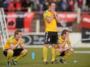 12 May 2012; Dejected Derry City players, from left, Simon Madden, Barry Molloy and Dermot McCaffrey after the game. Setanta Sports Cup Final, Crusaders v Derry City, The Oval, Belfast, Co. Antrim. Picture credit: Oliver McVeigh / SPORTSFILE