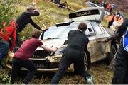 18 August 2017: Spectators assist after John Mulholland of Ireland and Jeff Case of Ireland, Skoda Fabia R5, crashed during SS3 Round 5 of the Irish Tarmac Rally Championships in the 2017 John Mulholland Motors Ulster Rally at Butterlope in Plumbridge, Co Tyrone. Photo by Philip Fitzpatrick/Sportsfile