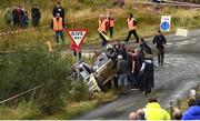 18 August 2017: Spectators assist after John Mulholland of Ireland and Jeff Case of Ireland, Skoda Fabia R5, crashed during SS3 Round 5 of the Irish Tarmac Rally Championships in the 2017 John Mulholland Motors Ulster Rally at Butterlope in Plumbridge, Co Tyrone. Photo by Philip Fitzpatrick/Sportsfile