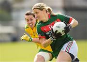 19 August 2017; Cora Staunton of Mayo in action against Nicole McLaughlin of Donegal during the TG4 Ladies Football All-Ireland Senior Championship Quarter-Final match between Donegal and Mayo at Cusack Park in Westmeath. Photo by Matt Browne/Sportsfile