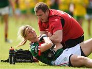 19 August 2017; Cora Staunton of Mayo receives treatment for a shoulder injury from team physio Brendan Fitzpatrick during the TG4 Ladies Football All-Ireland Senior Championship Quarter-Final match between Donegal and Mayo at Cusack Park in Westmeath. Photo by Matt Browne/Sportsfile