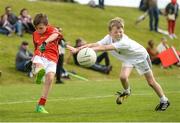19 August 2017; Danny Nash from Monaleen, Co Kildare, in action against Adam Corbett of Kildare during their U10 Gaelic Football match during day 1 of the Aldi Community Games August Festival 2017 at the National Sports Campus in Dublin. Photo by Cody Glenn/Sportsfile
