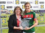 19 August 2017; Grace Kelly of Mayo is presented with her player of the match award by LGFA President Marie Hickey after the TG4 Ladies Football All-Ireland Senior Championship Quarter-Final match between Donegal and Mayo at Cusack Park in Westmeath. Photo by Matt Browne/Sportsfile