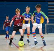 19 August 2017; Fionn Carter, from Ballinacally-Lissycasey, Co Clare, in action against Daragh McConnan of Erne Valley, Co Cavan, during the U13 Indoor Soccer during day 1 of the Aldi Community Games August Festival 2017 at the National Sports Campus in Dublin. Photo by Cody Glenn/Sportsfile