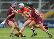 19 August 2017; Meabh Cahalane of Cork in action against Niamh Kilkenny, left, and Aoife Donohue of Galway during the All-Ireland Senior Camogie Championship Semi-Final between Cork and Galway at the Gaelic Grounds in Limerick. Photo by Diarmuid Greene/Sportsfile