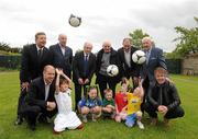 17 May 2012; RTÉ pundits and presenters, from left, Darragh Maloney, Liam Brady, John Giles, Eamon Dunphy, Richard Sadlier, Bill O'Herlihy, Kenny Cunningham, front row, left, and Hector O'hEochagain, front row, right, with children, from left, Rowan Durmis, age 6, from Citywest, Dublin, Susie Power, age 8, from Kilcullen, Co. Kildare, Callum Heath, age 4, from Tallaght, Dublin, Robyn Dempsey, age 5, from Kilcullen, Co. Kildare, and Liam Hyland, age 5, from Walkinstown, Dublin, at the launch of RTÉ’s EURO 2012 coverage. RTÉ, Donnybrook, Dublin. Picture credit: Stephen McCarthy / SPORTSFILE