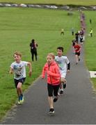 20 August 2017; Parkrun Ireland, in partnership with Vhi, expanded their range of junior events to ten with the introduction of the Oranmore Junior Parkrun on Sunday morning. Junior parkruns are 2km long and cater for 4 to 14 year olds, free of charge providing a fun and safe environment for children to enjoy exercise. To register for a parkrun near you visit www.parkrun.ie. New registrants should select their chosen event as their home location. You will then receive a personal barcode which acts as your free entry to any parkrun event worldwide. Pictured are participants during the Oranmore Junior Parkrun, in partnership with Vhi. Rinville Park, Oranmore, Co Galway. Photo by Diarmuid Greene/Sportsfile