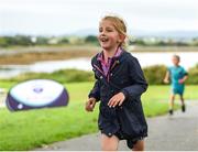 20 August 2017; Parkrun Ireland, in partnership with Vhi, expanded their range of junior events to ten with the introduction of the Oranmore Junior Parkrun on Sunday morning. Junior parkruns are 2km long and cater for 4 to 14 year olds, free of charge providing a fun and safe environment for children to enjoy exercise. To register for a parkrun near you visit www.parkrun.ie. New registrants should select their chosen event as their home location. You will then receive a personal barcode which acts as your free entry to any parkrun event worldwide. Pictured during the Oranmore Junior Parkrun, in partnership with Vhi is Amy McNally, aged 6, from Oranmore. Rinville Park, Oranmore, Co Galway. Photo by Diarmuid Greene/Sportsfile
