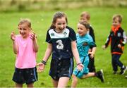 20 August 2017; Parkrun Ireland, in partnership with Vhi, expanded their range of junior events to ten with the introduction of the Oranmore Junior Parkrun on Sunday morning. Junior parkruns are 2km long and cater for 4 to 14 year olds, free of charge providing a fun and safe environment for children to enjoy exercise. To register for a parkrun near you visit www.parkrun.ie. New registrants should select their chosen event as their home location. You will then receive a personal barcode which acts as your free entry to any parkrun event worldwide. Pictured enjoying the water spray from the Fire Brigade's hose after the Oranmore Junior Parkrun, in partnership with Vhi are Amy McNally, aged 6, left, Abby McNally, aged 9, from Oranmore. Rinville Park, Oranmore, Co Galway. Photo by Diarmuid Greene/Sportsfile