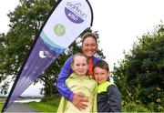 20 August 2017; Parkrun Ireland, in partnership with Vhi, expanded their range of junior events to ten with the introduction of the Oranmore Junior Parkrun on Sunday morning. Junior parkruns are 2km long and cater for 4 to 14 year olds, free of charge providing a fun and safe environment for children to enjoy exercise. To register for a parkrun near you visit www.parkrun.ie. New registrants should select their chosen event as their home location. You will then receive a personal barcode which acts as your free entry to any parkrun event worldwide. Pictured at the Oranmore Junior Parkrun, in partnnership with Vhi are Rachel Conroy, aged 8, and Ruaidhri Conroy, aged 7, along with their mother Edel Conroy, from 'Gotta Run', Galway. Rinville Park, Oranmore, Co Galway. Photo by Diarmuid Greene/Sportsfile