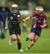 20 August 2017; Caoimhe Nolan, from Bagenalstown, Co Carlow, in action against Caroline Joyce, from Athenry, Co Galway, during the Girls U14 Camogie final during day 2 of the Aldi Community Games August Festival 2017 at the National Sports Campus in Dublin. Photo by Cody Glenn/Sportsfile
