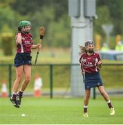 20 August 2017; Sabina Rabbitte, left, and team-mate Emma Fitzgerald of the Athenry Co Galway Girls U14 Camogie team celebrate at the final whistle after winning the championship by beating Bagenalstown, Co Carlow, during day 2 of the Aldi Community Games August Festival 2017 at the National Sports Campus in Dublin. Photo by Cody Glenn/Sportsfile