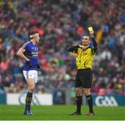 20 August 2017; Referee Maurice Deegan indicates why he had shown a yellow card to David Moran of Kerry  during the GAA Football All-Ireland Senior Championship Semi-Final match between Kerry and Mayo at Croke Park in Dublin. Photo by Ray McManus/Sportsfile