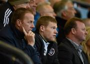 18 May 2012; Republic of Ireland International James McClean watches on during the game alongside PFAI General Secretary Stephen McGuinness, left. Airtricity League Premier Division, Bohemians v Derry City, Dalymount Park, Dublin. Picture credit: Stephen McCarthy / SPORTSFILE
