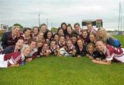 19 May 2012; Westmeath celebrate with the cup after the game. Bord Gáis Energy Ladies National Football League, Division 3 Final Replay, Westmeath v Leitrim, Emmet Park, Killoe, Co. Longford. Photo by Sportsfile