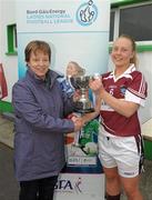 19 May 2012; Kathleen Kane, Connacht Ladies Council President presents the cup to Westmeath captain Jenny Rogers. Bord Gáis Energy Ladies National Football League, Division 3 Final Replay, Westmeath v Leitrim, Emmet Park, Killoe, Co. Longford. Photo by Sportsfile