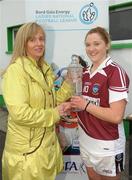19 May 2012; Helen O'Rourke, CEO of the Ladies Gaelic Football Association presents Westmeath's Elain Finn with the Player of the Match award. Bord Gáis Energy Ladies National Football League, Division 3 Final Replay, Westmeath v Leitrim, Emmet Park, Killoe, Co. Longford. Photo by Sportsfile
