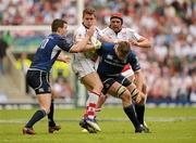 19 May 2012; Craig Gilroy, Ulster, is tackled by Jonathon Sexton and Brad Thorn, right, Leinster. Heineken Cup Final, Leinster v Ulster, Twickenham Stadium, Twickenham, England. Picture credit: Oliver McVeigh / SPORTSFILE