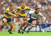 11 August 2002; Tony Browne of Waterford in action against Jamesie O'Connor, left, and Colin Lynch of Clare during the Guinness All-Ireland Senior Hurling Championship Semi-Final match between Clare and Waterford at Croke Park in Dublin. Photo by Ray McManus/Sportsfile