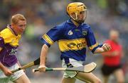 11 August 2002; Evan Sweeney of Tipperary in action against John Roche of Wexford during the All-Ireland Minor Hurling Championship Semi-Final match between Wexford and Tipperary at Croke Park in Dublin. Photo by Ray McManus/Sportsfile