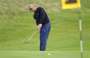 15 August 2002; Andrew Coltart watches his putt on the 15th green during day one of the North West of Ireland Open at Ballyliffin Golf Club, Glasheby Links, in Donegal. Photo by Matt Browne/Sportsfile