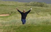 15 August 2002; Andrew Coltart celebrates after getting his fourth shot out of the rough onto the 17th fairway before he got a double bogey 7 on the par 5 hole during day one of the North West of Ireland Open at Ballyliffin Golf Club, Glasheby Links, in Donegal. Photo by Matt Browne/Sportsfile