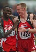 11 August 2002; Wilson Kipketer of Denmark, left, celebrates winning gold with silver medallist Andre Bucker of Switzerland in the Men's 800m Final at the European Championships in the Olympic Stadium in Munich, Germany. Photo by Brendan Moran/Sportsfile