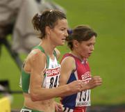10 August 2002; Sonia O'Sullivan of Ireland, 849, alongside Yelena Zadorozhnaya of Russia, 1377, during the Women's 5000m Final at the European Championships in the Olympic Stadium in Munich, Germany. Photo by Brendan Moran/Sportsfile