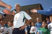 16 August 2002; Republic of Ireland manager Mick McCarthy answers questions from the media during a visit to the FAI 7up Summer Soccer Schools at Trinity Sports and Leisure Complex in Donaghmeade, Dublin. Photo by David Maher/Sportsfile