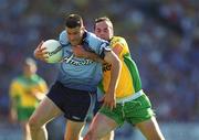 17 August 2002; Senan Connell of Dublin is tackled by Damien Diver of Donegal during the Bank of Ireland All-Ireland Senior Football Championship Quarter-Final Replay match between Dublin and Donegal at Croke Park in Dublin. Photo by Ray McManus/Sportsfile