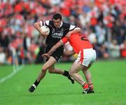 18 August 2002; Darragh McGarty of Sligo in action against John Donaldson of Armagh during the Bank of Ireland All-Ireland Senior Football Championship Quarter-Final Replay match between Armagh and Sligo at Páirc Tailteann in Navan, Meath. Photo by Aoife Rice/Sportsfile