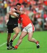 18 August 2002; Dara McGarty of Sligo in action against John Donaldson of Armagh during the Bank of Ireland All-Ireland Senior Football Championship Quarter-Final Replay match between Armagh and Sligo at Páirc Tailteann in Navan, Meath. Photo by Aoife Rice/Sportsfile