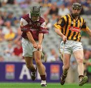 18 August 2002; Kenneth Burke of Galway shoots to score his side's second goal, as John Tennyson of Kilkenny looks on, during the All-Ireland Minor Hurling Championship Semi-Final match between Kilkenny and Galway at Croke Park in Dublin. Photo by Damien Eagers/Sportsfile