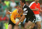 18 August 2002; Armagh goalkeeper Brendan Tierney is tackled by Dessie Sloyan of Sligo during the Bank of Ireland All-Ireland Senior Football Championship Quarter-Final Replay match between Armagh and Sligo at Páirc Tailteann in Navan, Meath. Photo by Aoife Rice/Sportsfile