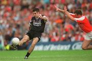 18 August 2002; Sean Davey of Sligo in action against Justin McNulty of Armagh during the Bank of Ireland All-Ireland Senior Football Championship Quarter-Final Replay match between Armagh and Sligo at Páirc Tailteann in Navan, Meath. Photo by Aoife Rice/Sportsfile