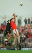 18 August 2002; Eamonn O'Hara of Sligo in action against Paddy McKeever of Armagh during the Bank of Ireland All-Ireland Senior Football Championship Quarter-Final Replay match between Armagh and Sligo at Páirc Tailteann in Navan, Meath. Photo by Aoife Rice/Sportsfile