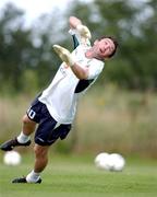 18 August 2002; Robbie Keane shows off his goalkeeping skills during a Republic of Ireland training session at the AUL Complex in Clonshaugh, Dublin. Photo by David Maher/Sportsfile