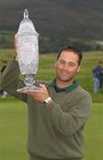 18 August 2002; Champion Adam Mednick with the trophy after day four of the North West of Ireland Open at Ballyliffin Golf Club, Glasheby Links, in Donegal. Photo by Matt Browne/Sportsfile