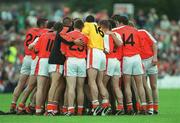 18 August 2002; Armagh players in a huddle prior to the Bank of Ireland All-Ireland Senior Football Championship Quarter-Final Replay match between Armagh and Sligo at Páirc Tailteann in Navan, Meath. Photo by Aoife Rice/Sportsfile