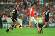 18 August 2002; Andrew McCann of Armagh in action against Dessie Sloyan of Sligo during the Bank of Ireland All-Ireland Senior Football Championship Quarter-Final Replay match between Armagh and Sligo at Páirc Tailteann in Navan, Meath. Photo by Aoife Rice/Sportsfile