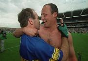 18 August 2002; Kilkenny players DJ Carey, left, and Andy Comerford celebrate after the Guinness All-Ireland Senior Hurling Championship Semi-Final match between Kilkenny and Tipperary at Croke Park in Dublin. Photo by Ray McManus/Sportsfile